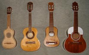 From left to right: Portuguese cavaquinho, Brazilian cavaquinho, a cavaquinho from the island of St. Antão in Cape Verde (not very common) and the standard (note, much larger) Cape Verdean cavaquinho on far right. photo: www.atlasofpluckedinstruments.com